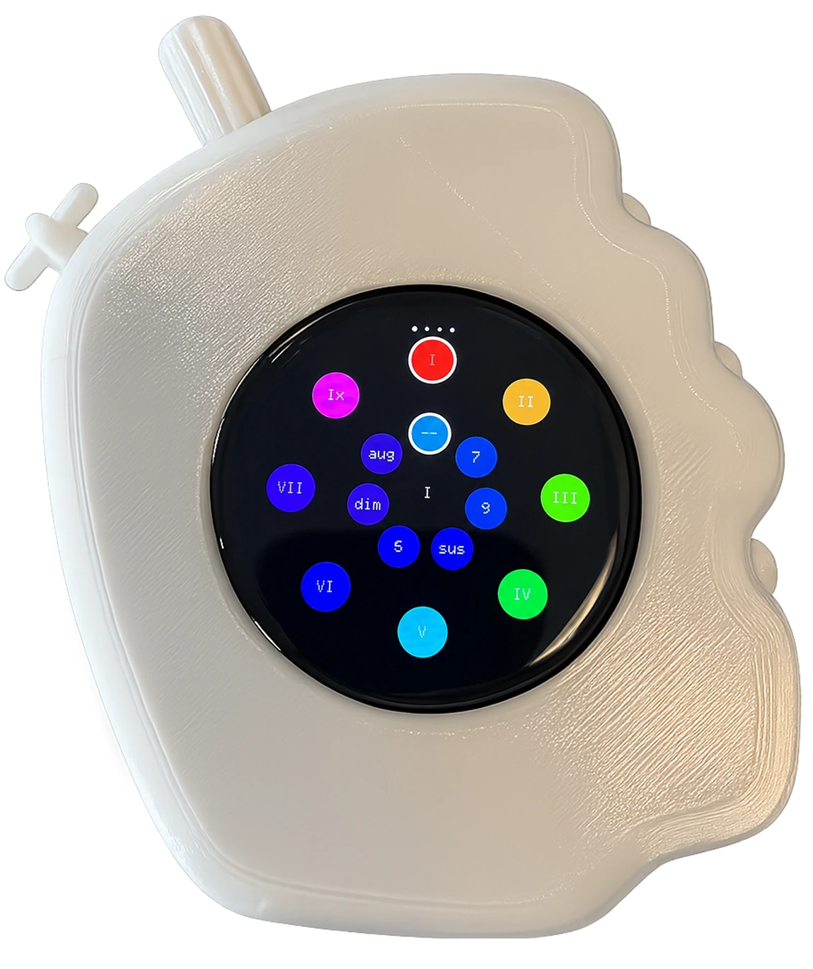 The printed prototype, powered on: a soft pebble-shaped bone-white enclosure with a knurled encoder at the top edge and a four-way switch beside it. The circular screen shows the chord interface — Roman-numeral degrees I to VII ringed around a centre cluster of quality buttons for dim, aug, sus, 5, 7 and 9, each in a different colour.